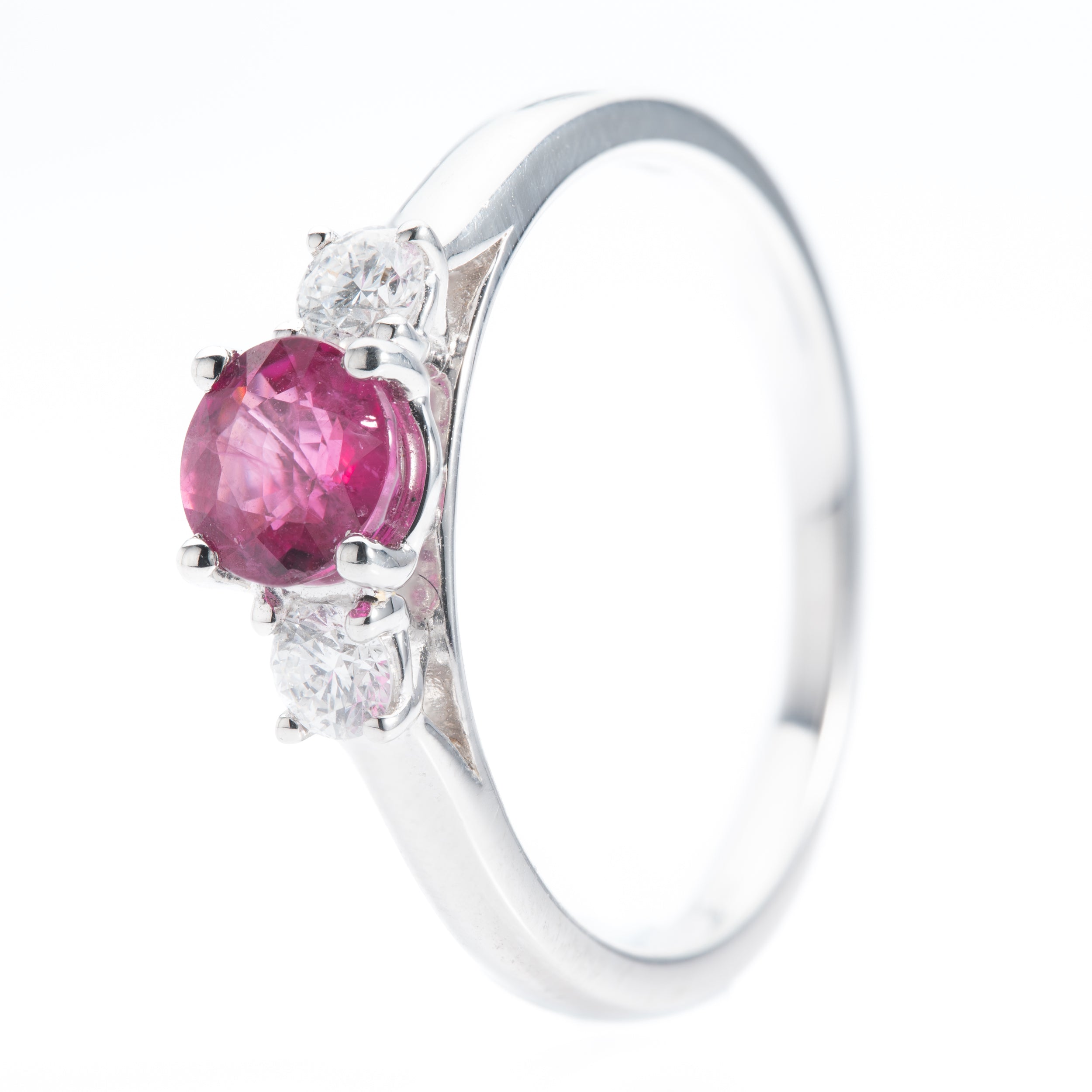 Platinum Round Cut Ruby and Brilliant Cut Diamond Trilogy Ring