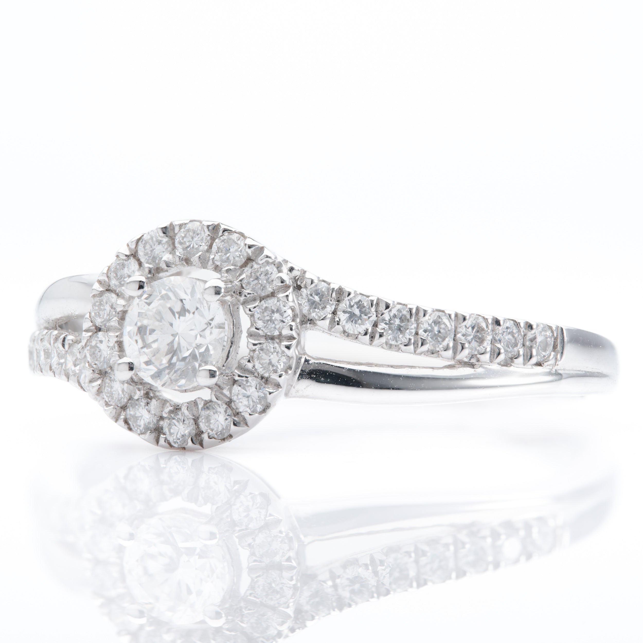 Platinum Twist Round Brilliant Cut Diamond Halo cluster Ring