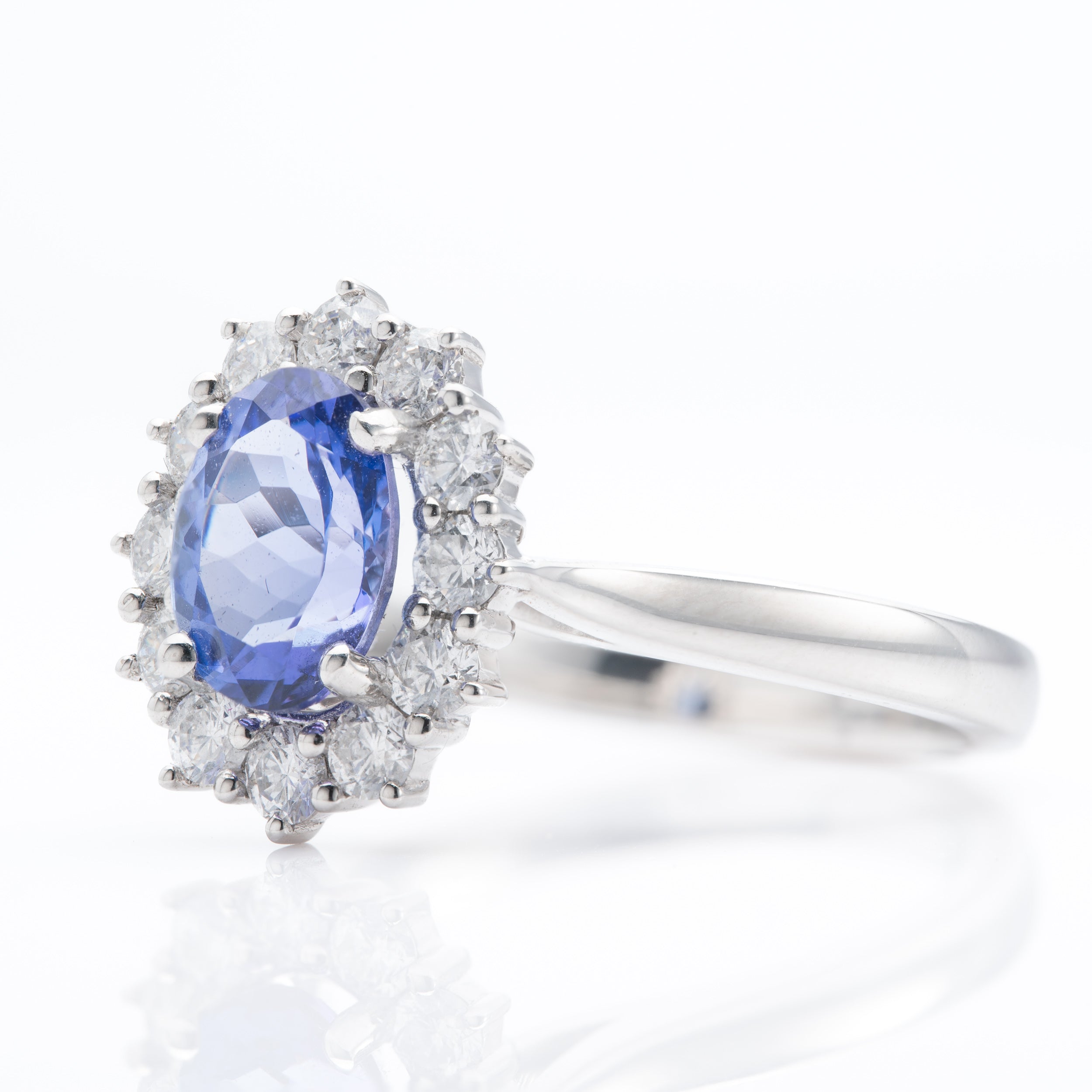 Platinum Oval Cut Tanzanite & Round Brilliant Cut Diamond Cluster Ring