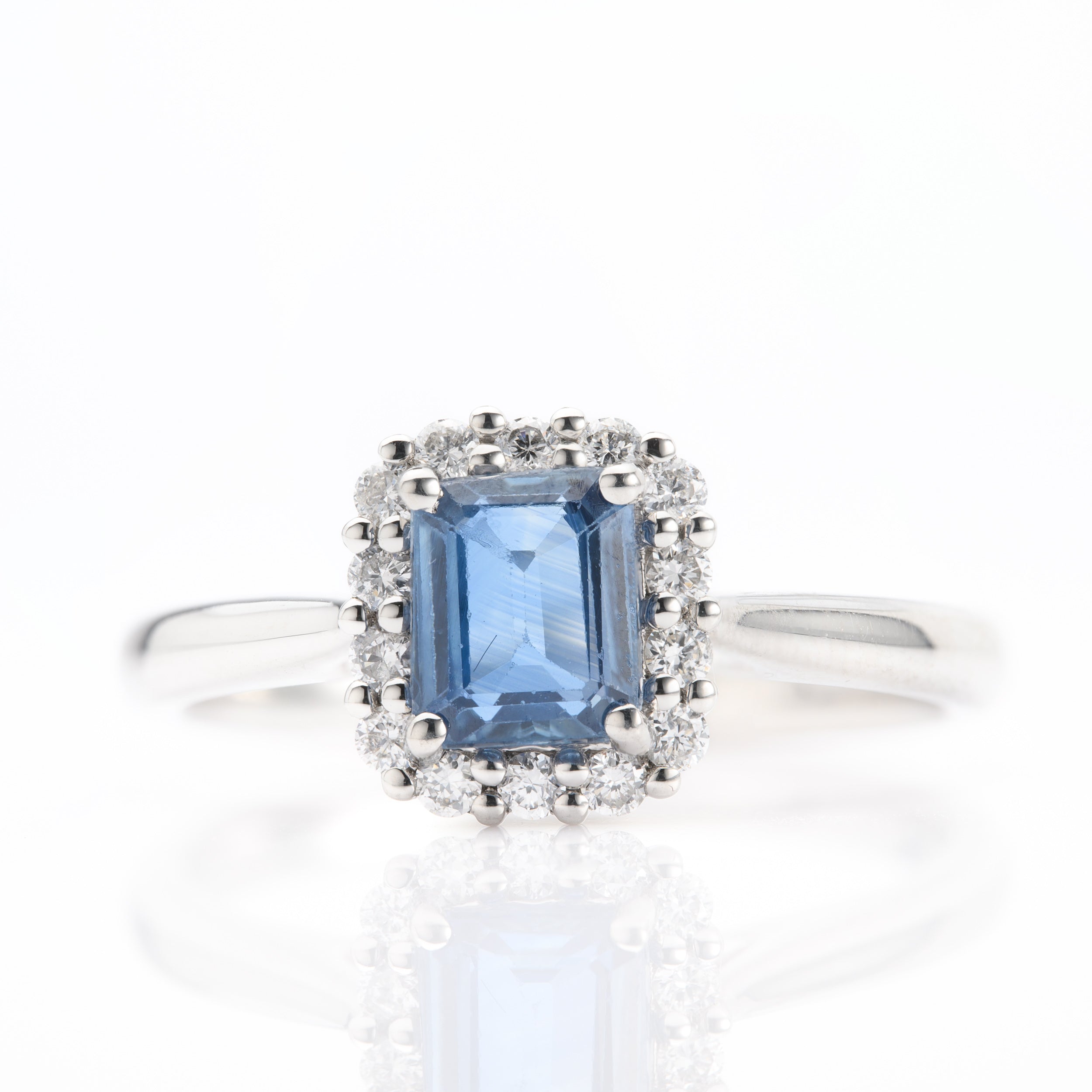 Platinum Octagonal Cut Sapphire & Round Brilliant Cut Diamond Halo Cluster Ring