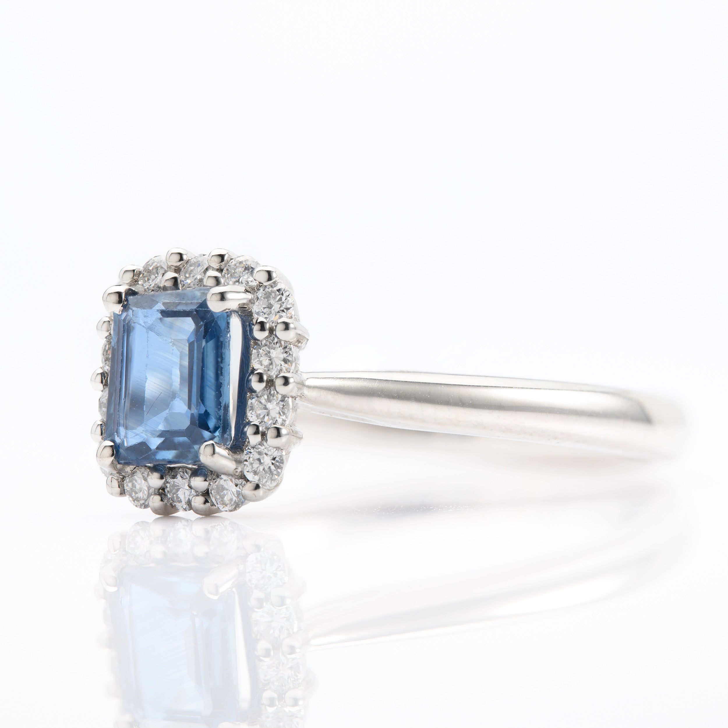 Platinum Octagonal Cut Sapphire & Round Brilliant Cut Diamond Halo Cluster Ring