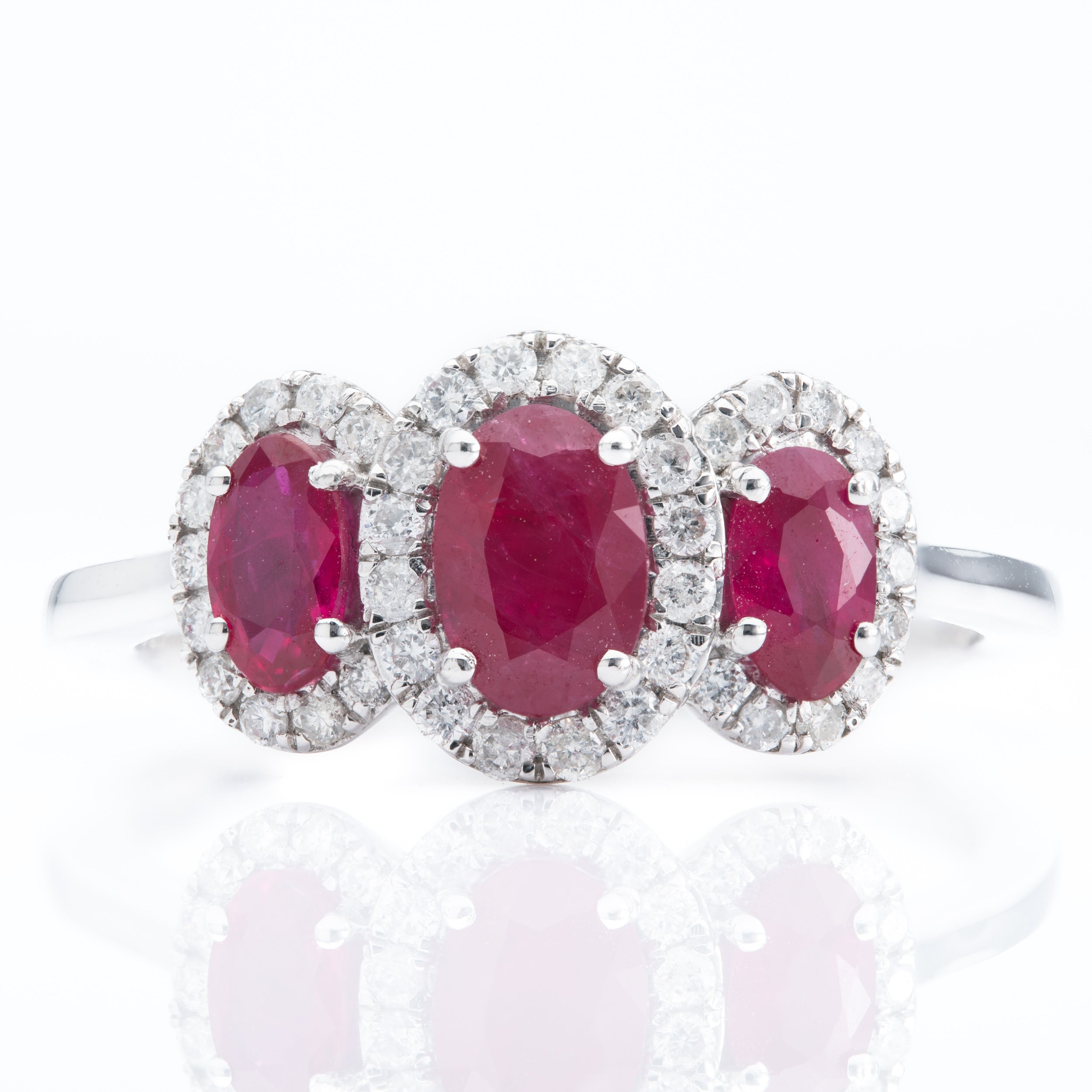 Platinum Oval Ruby & Diamond Triple Halo Cluster Ring