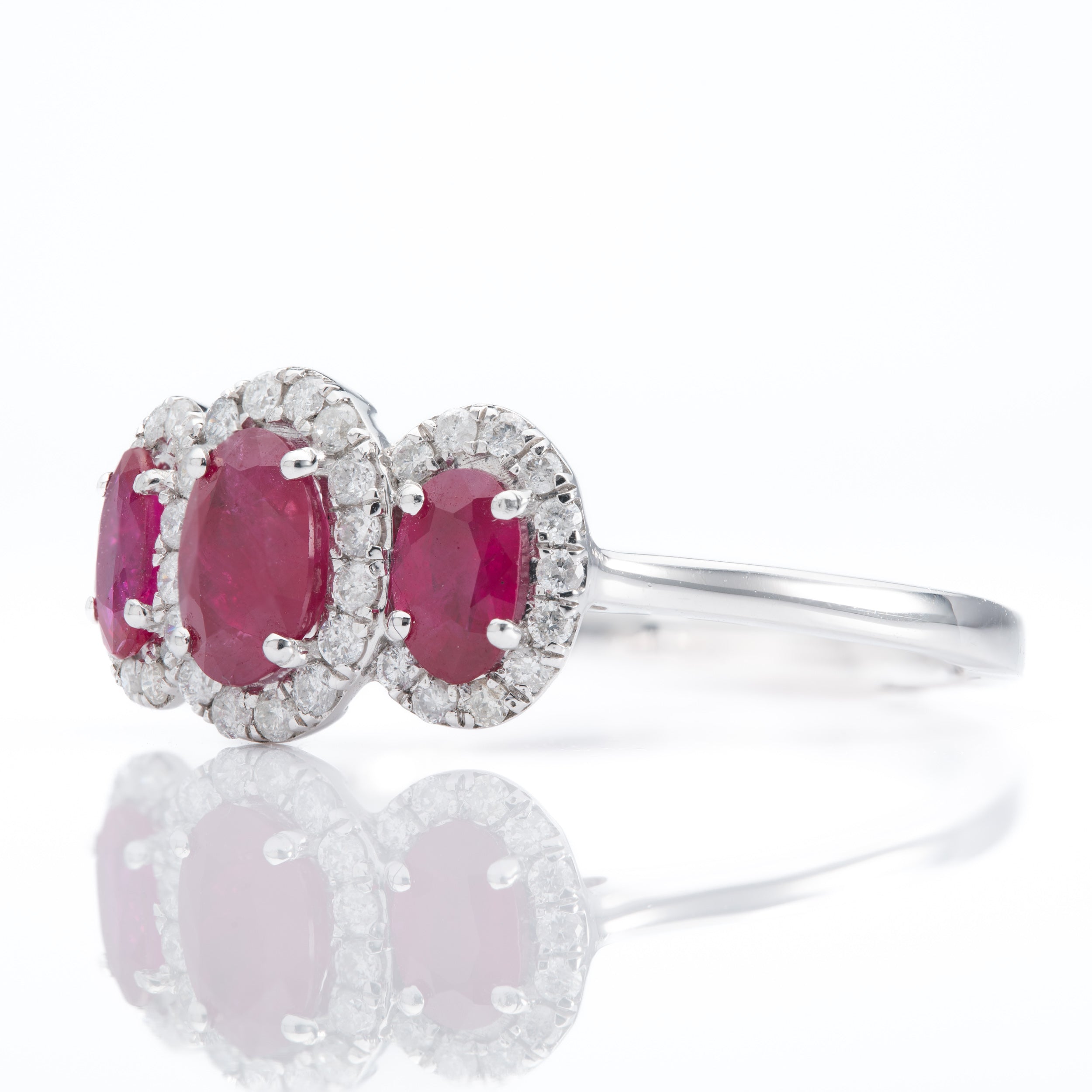 Platinum Oval Ruby & Diamond Triple Halo Cluster Ring