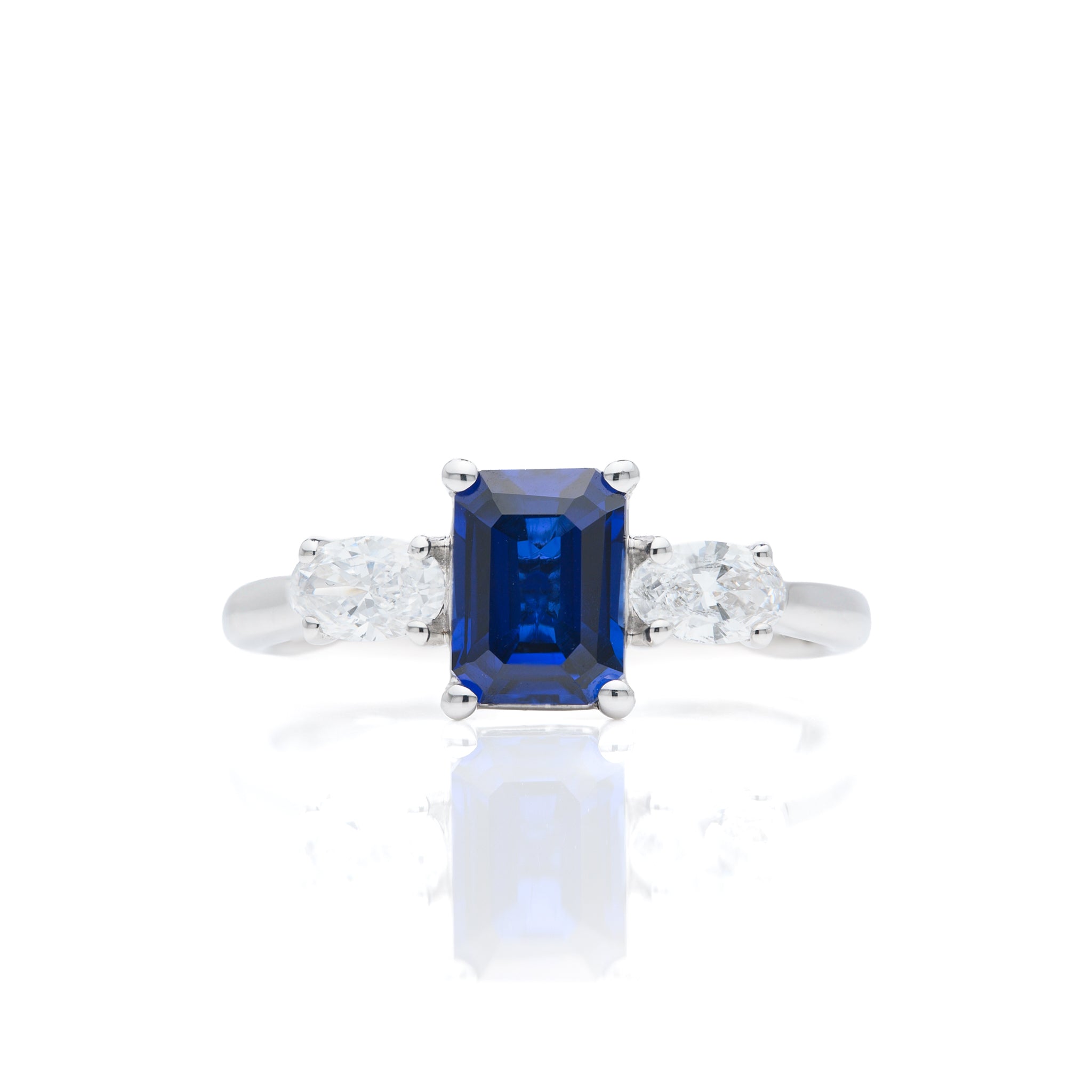 9ct White Gold Emerald Cut Lab Grown Sapphire and Oval Cut Lab Grown Diamond Trilogy Ring
