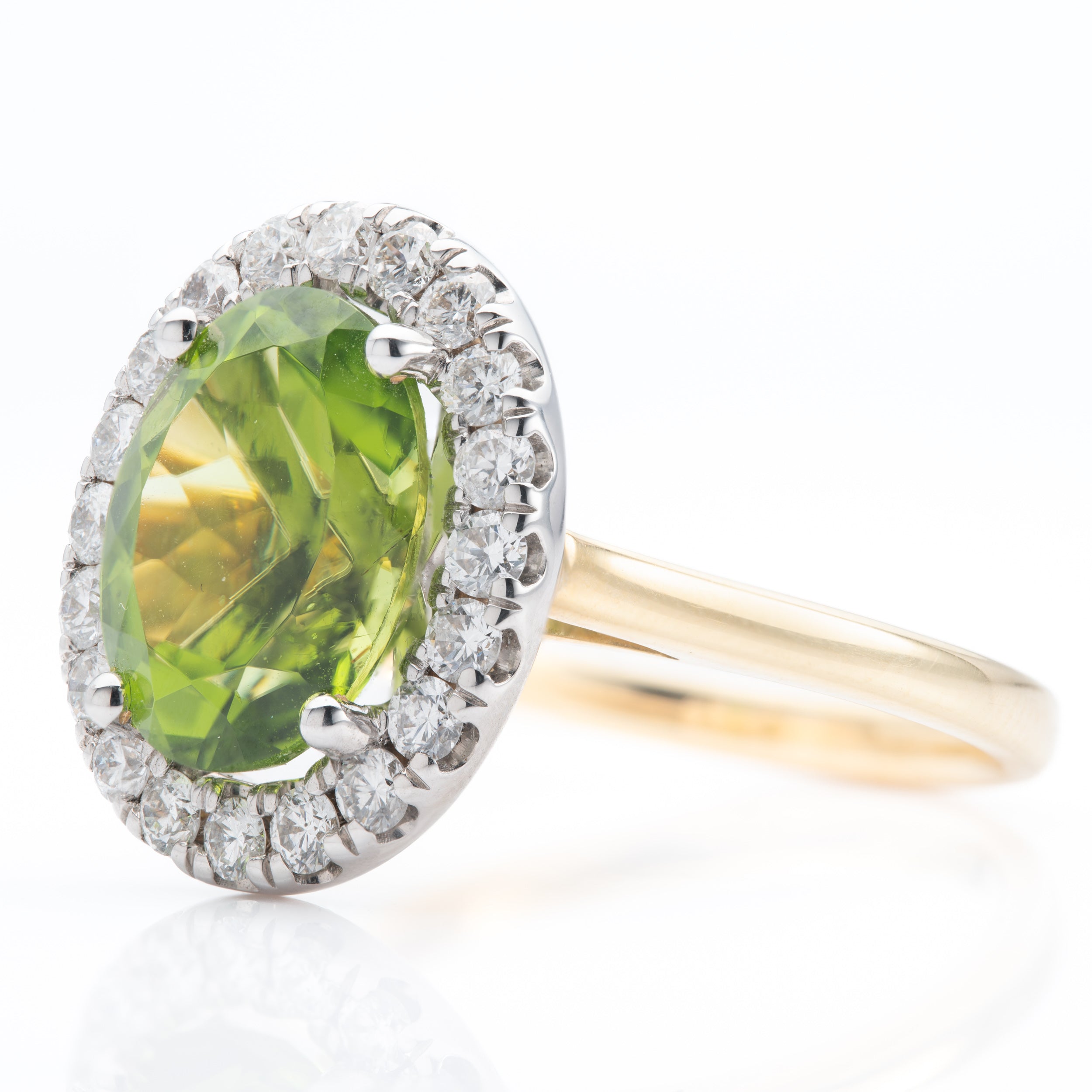 18ct Gold Oval Cut Peridot & Round Brilliant Cut Diamond Halo Cluster Ring