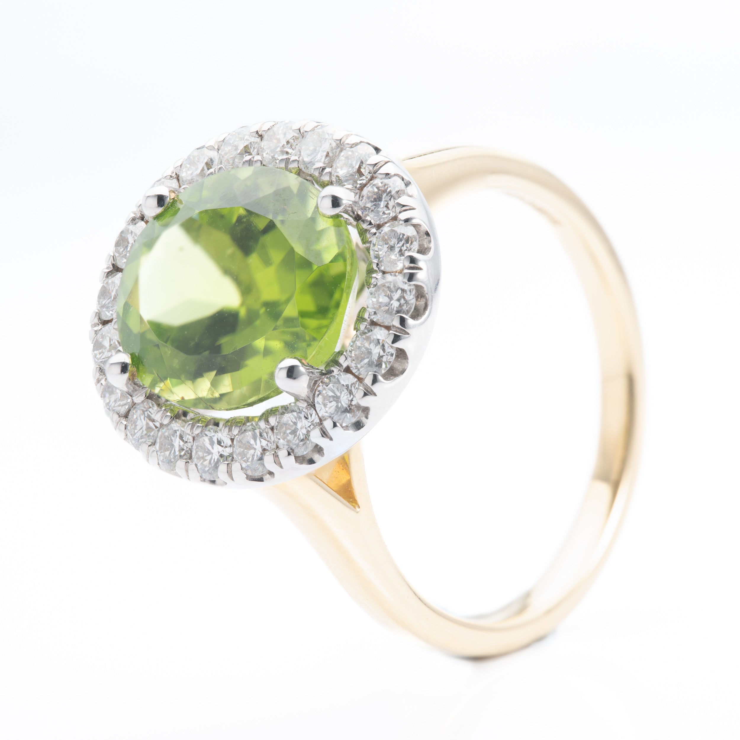 18ct Gold Oval Cut Peridot & Round Brilliant Cut Diamond Halo Cluster Ring