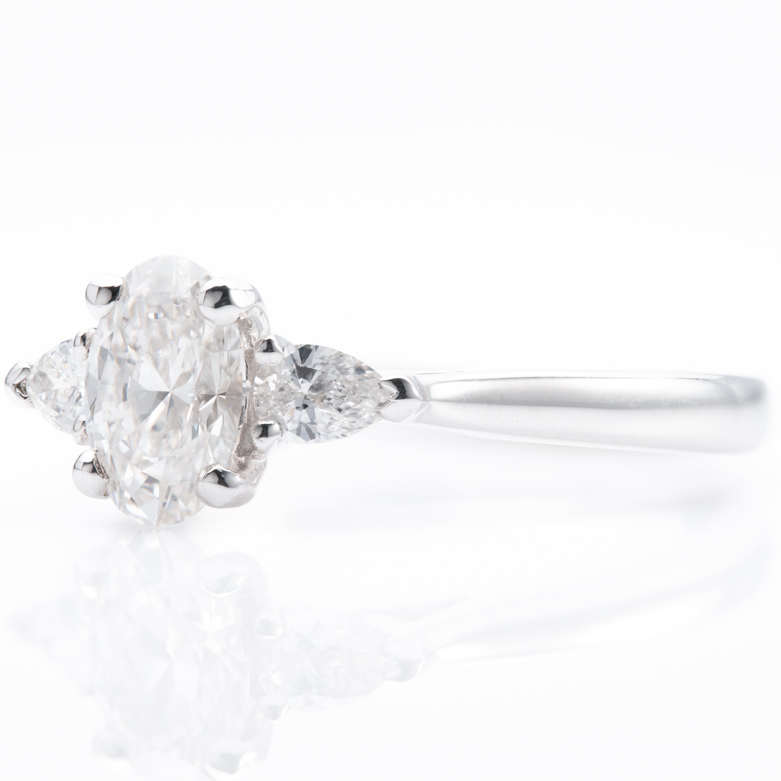 Platinum GIA Certificated Oval Cut & Pear Cut Diamond Trilogy Ring