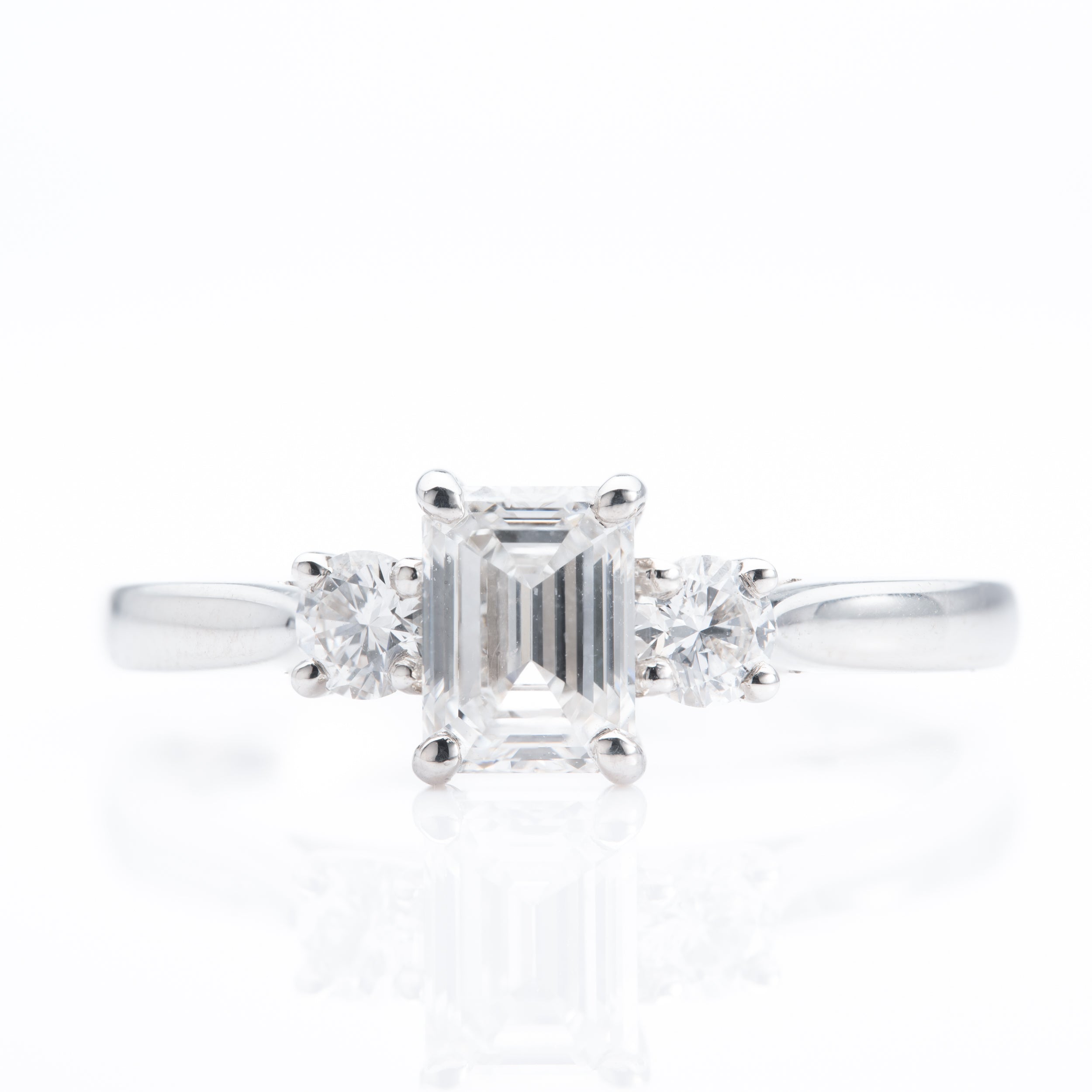 Platinum & Diamond Emerald Cut and Brilliant Cut Trilogy Ring