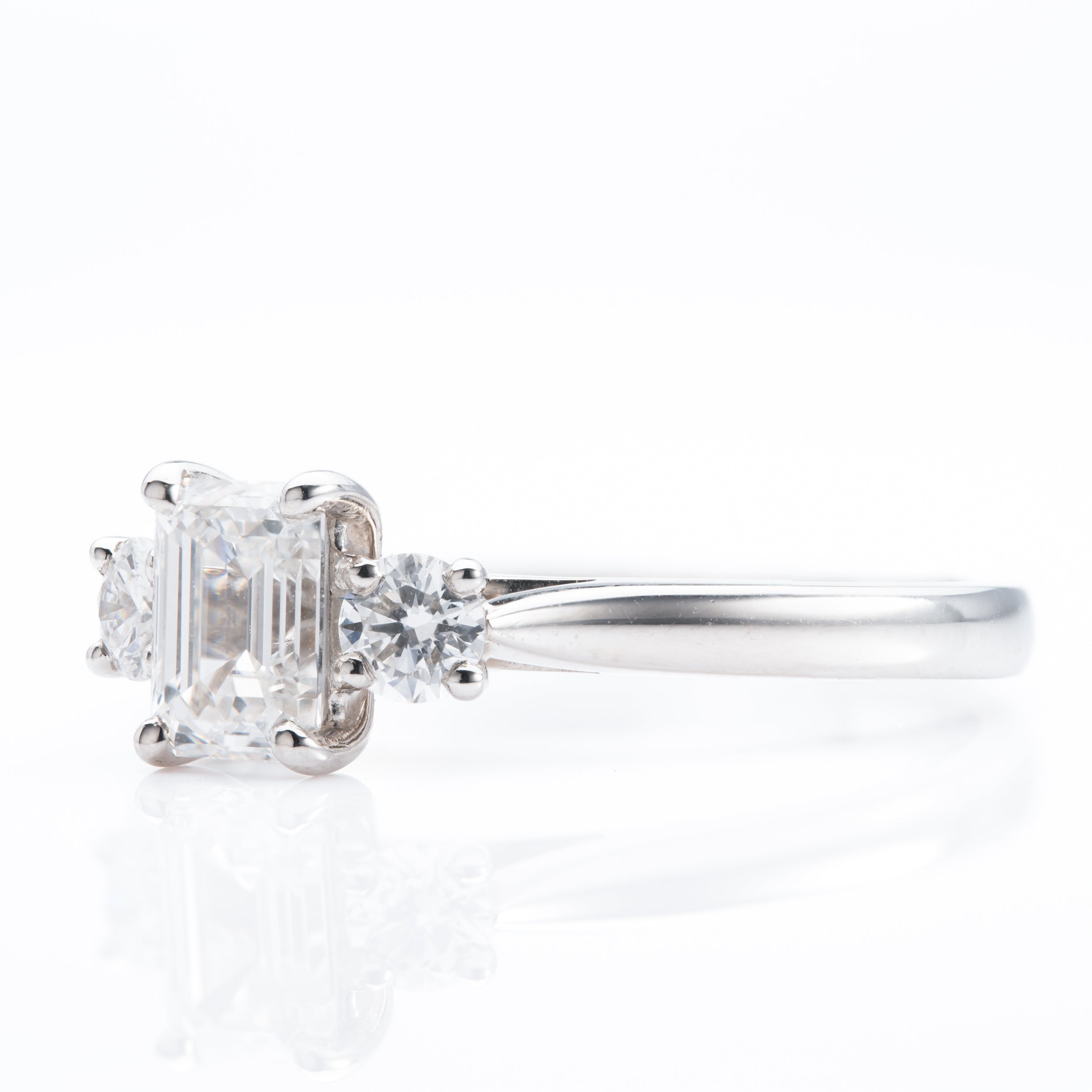 Platinum & Diamond Emerald Cut and Brilliant Cut Trilogy Ring