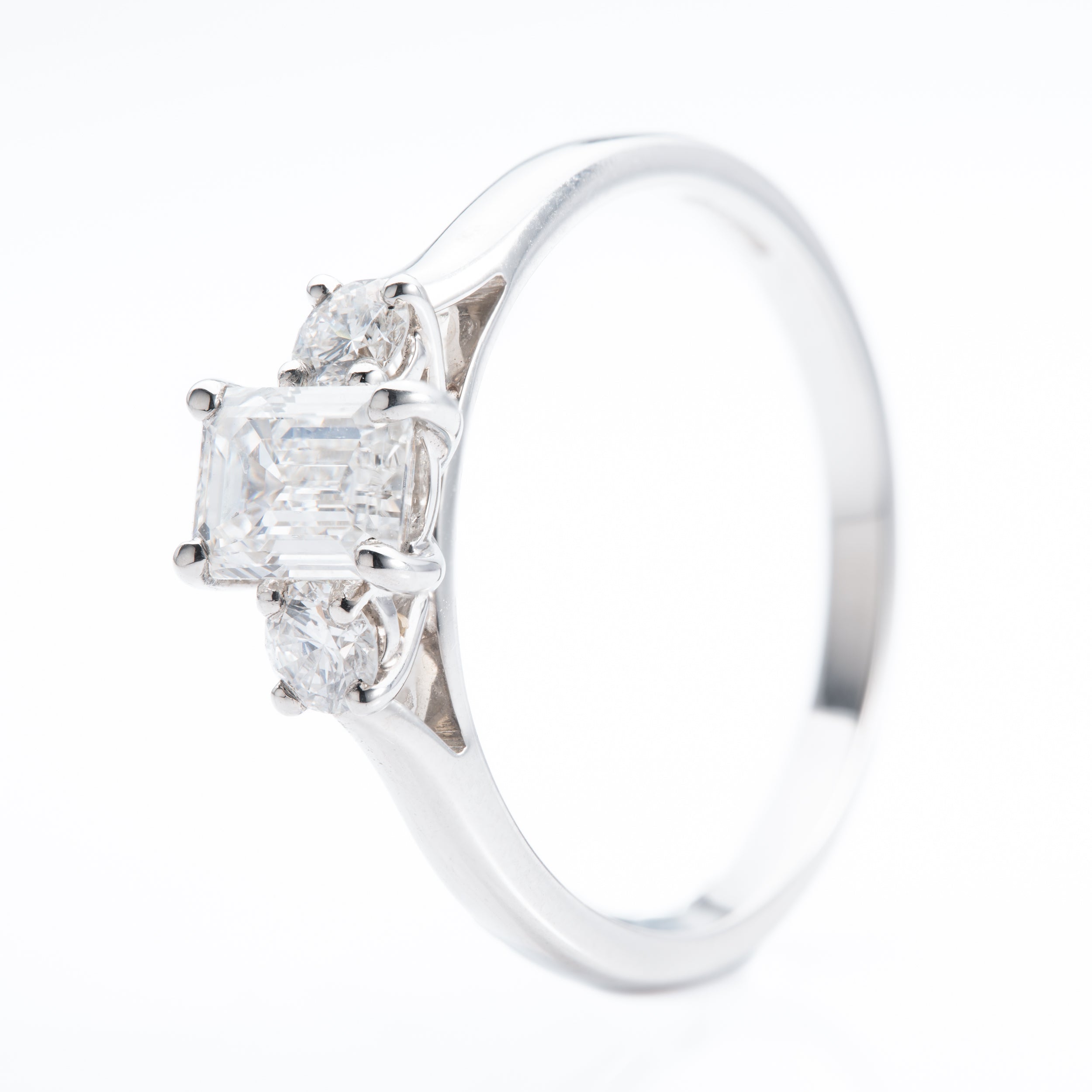 Platinum & Diamond Emerald Cut and Brilliant Cut Trilogy Ring