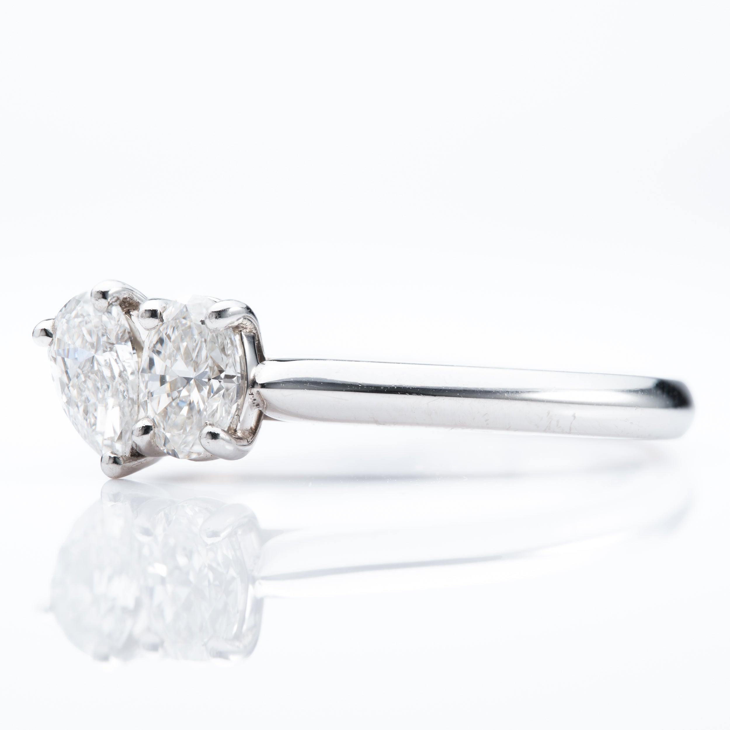 Platinum Pear and Oval Cut Diamond toi et moi Ring