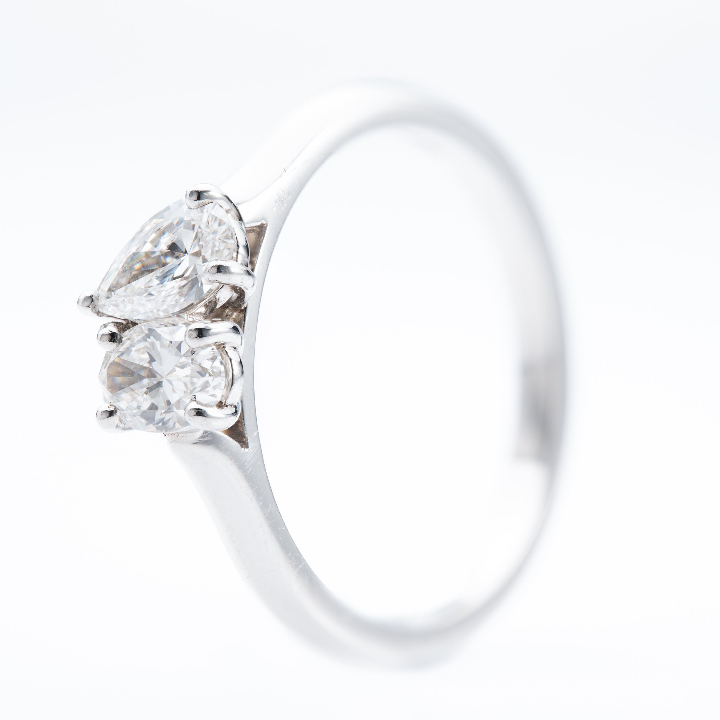 Platinum Pear and Oval Cut Diamond toi et moi Ring